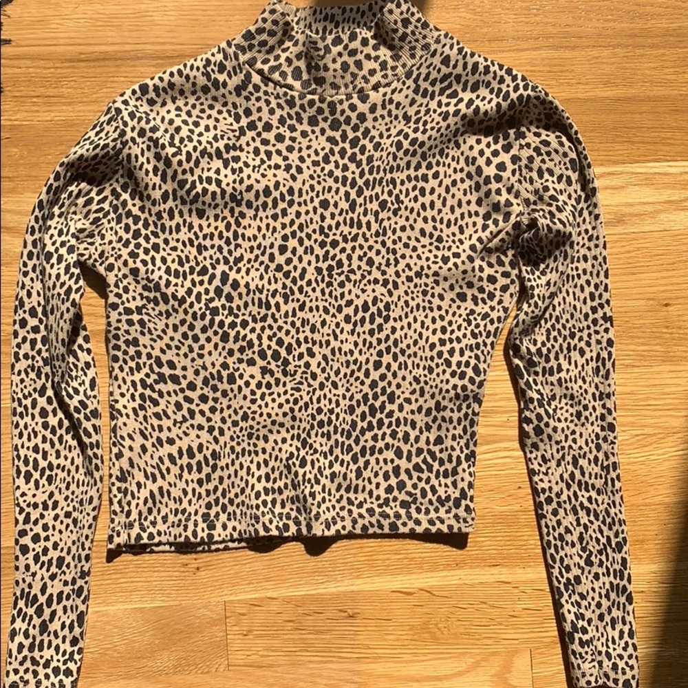 SOLD RARE cheetah top brandy melville